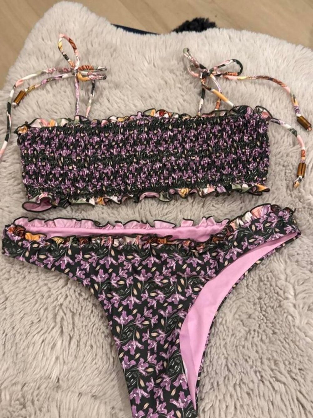 Purple and black floral bikini set with ruffles